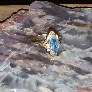 SOLD 14kt Gold Womens Blue Topaz and 3 Diamonds on the side Ring.